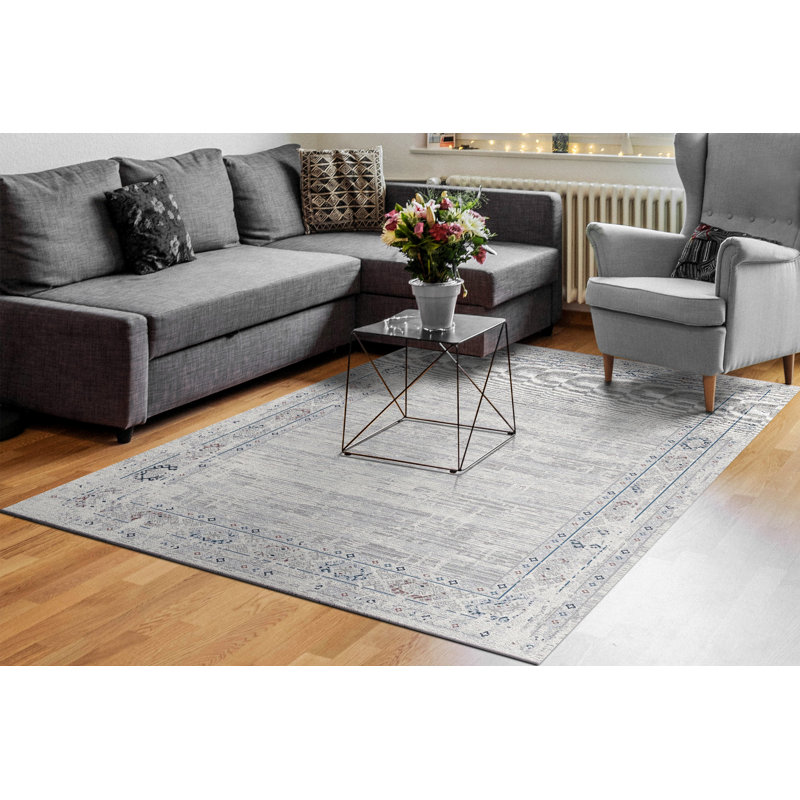 Carson Traditional Ivory & Blue Synthetic Rectangular Rug, 2'7" x 4'11"