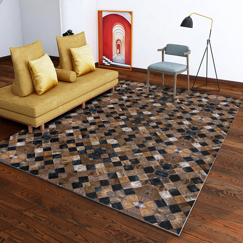 6' x 9' Black and Brown Faux Cowhide Area Rug