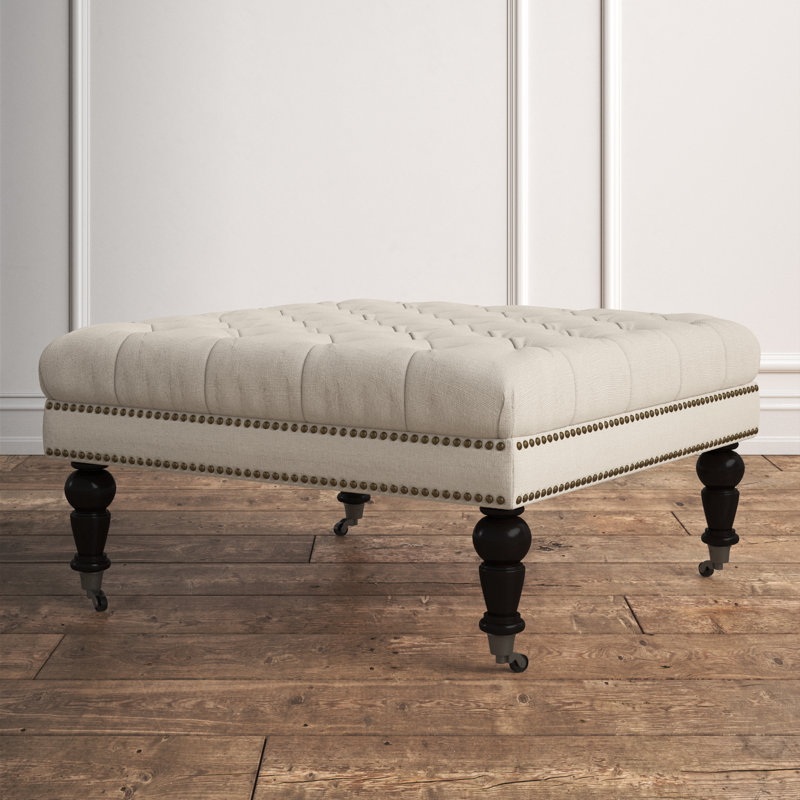 Isabelle 35" Tufted Linen Ottoman with Nailhead Accents