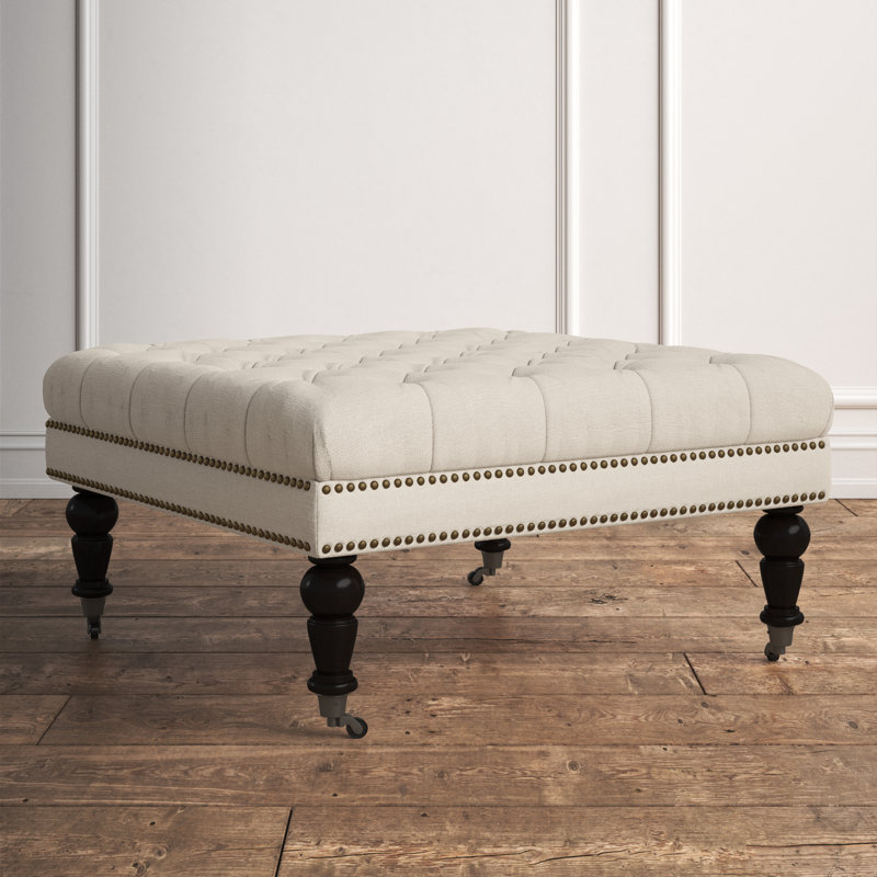 Isabelle 35" Tufted Linen Ottoman with Nailhead Accents