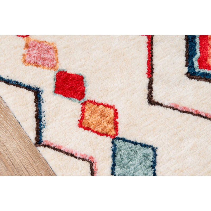 Vibrant Geometric Red Synthetic 7'6" x 9'6" Tufted Area Rug