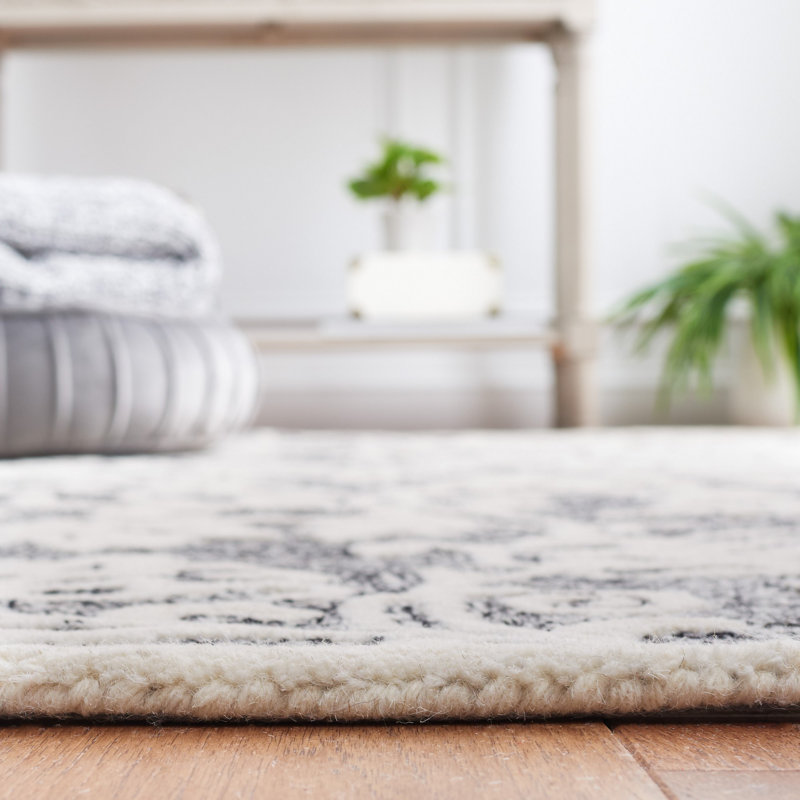 Black and Ivory Floral Hand-Tufted Wool Area Rug
