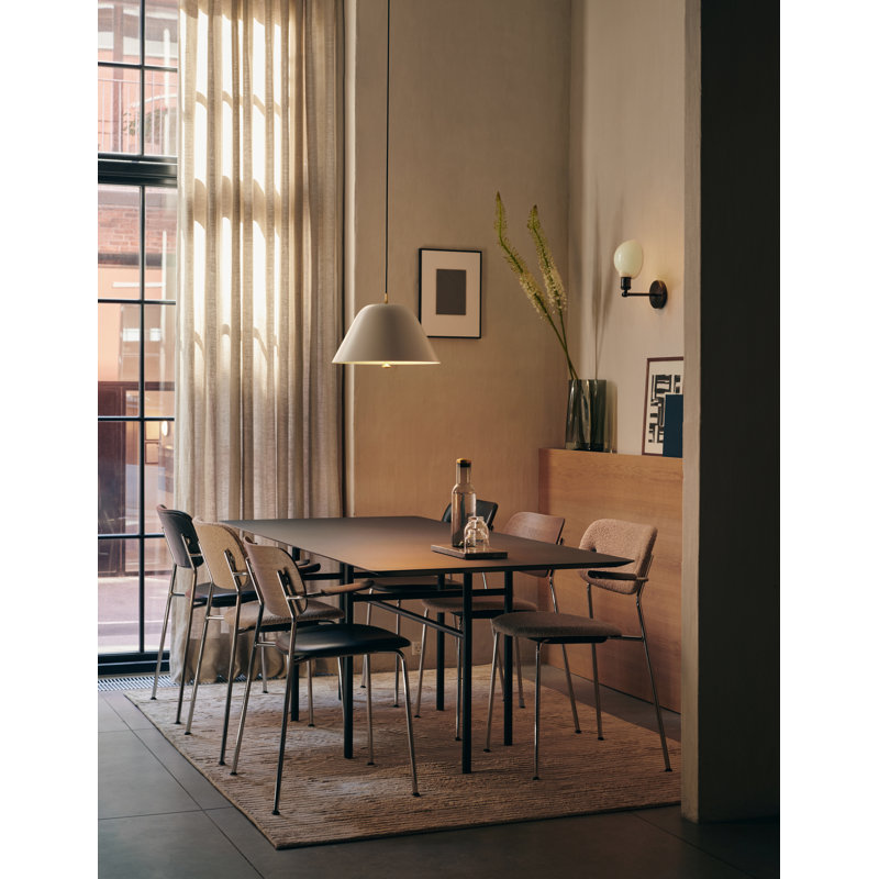 Cozy Minimalist Black Leather and Chrome Dining Chair with Armrests