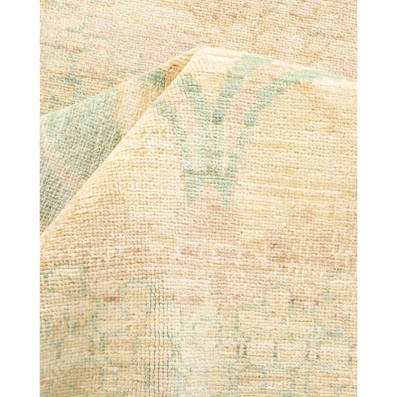 Hand-Knotted Ivory Wool Area Rug with Floral Motif
