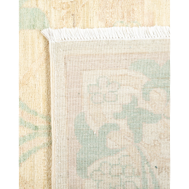 Hand-Knotted Ivory Wool Area Rug with Floral Motif