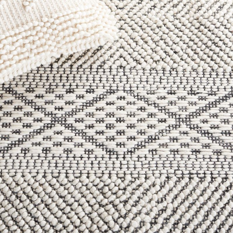 Handmade Black and Ivory Wool Area Rug 3' x 5'