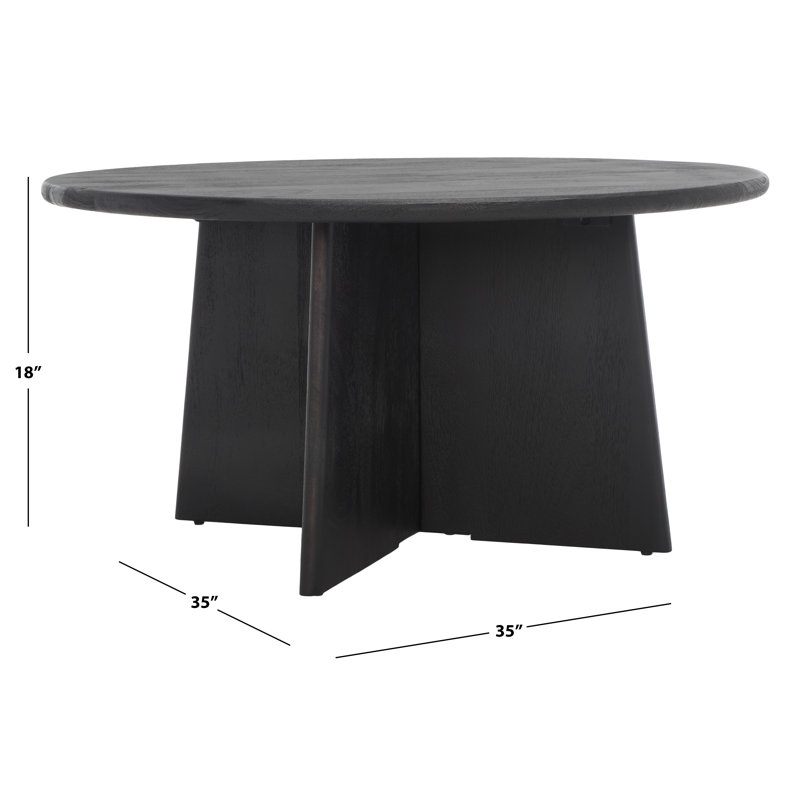 Madilynn 35" Black Mango Wood Round Coffee Table