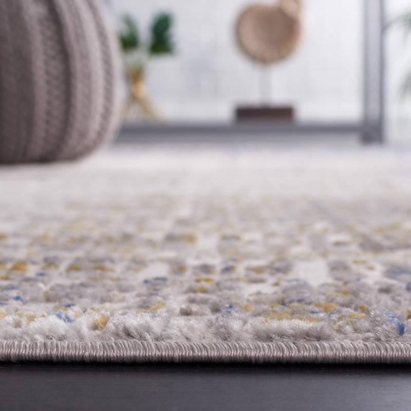 Beige and Blue Abstract Synthetic Area Rug