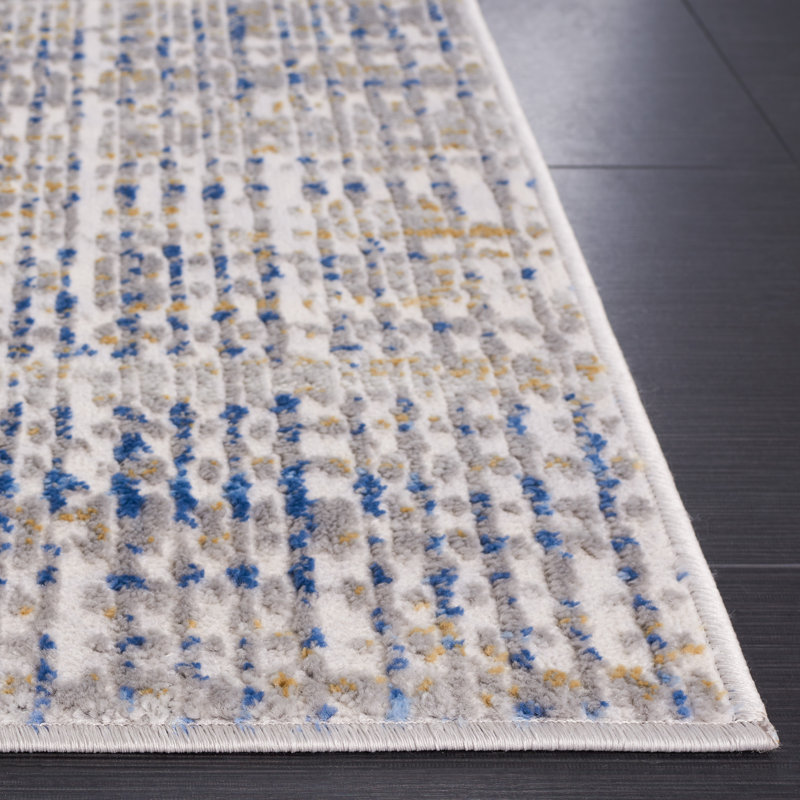 Beige and Blue Abstract Synthetic Area Rug