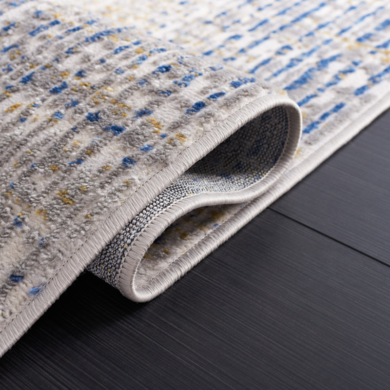 Beige and Blue Abstract Synthetic Area Rug