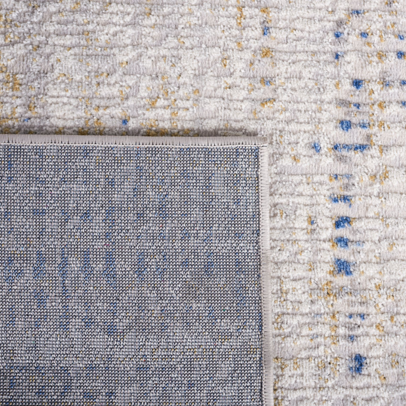 Beige and Blue Abstract Synthetic Area Rug