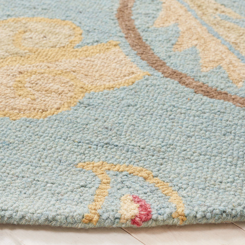 Handmade Blue Floral Tufted Wool Round Rug