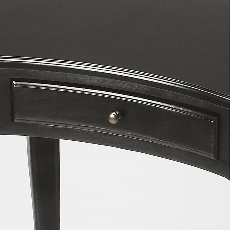 Elegant Crescent Black Licorice Writing Desk with Brass Accents