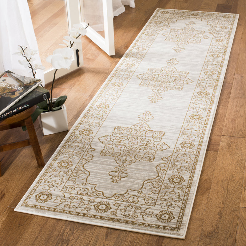 Elegant Cream and Gold Viscose 5'1" x 7'6" Traditional Area Rug