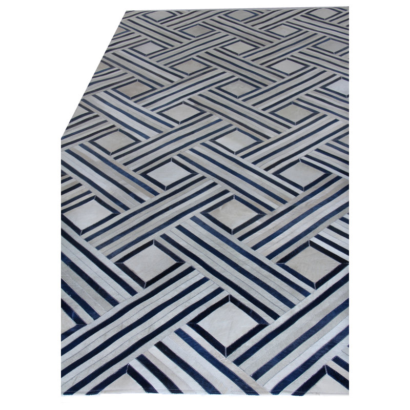 Handmade Ivory and Blue Geometric Cowhide Area Rug