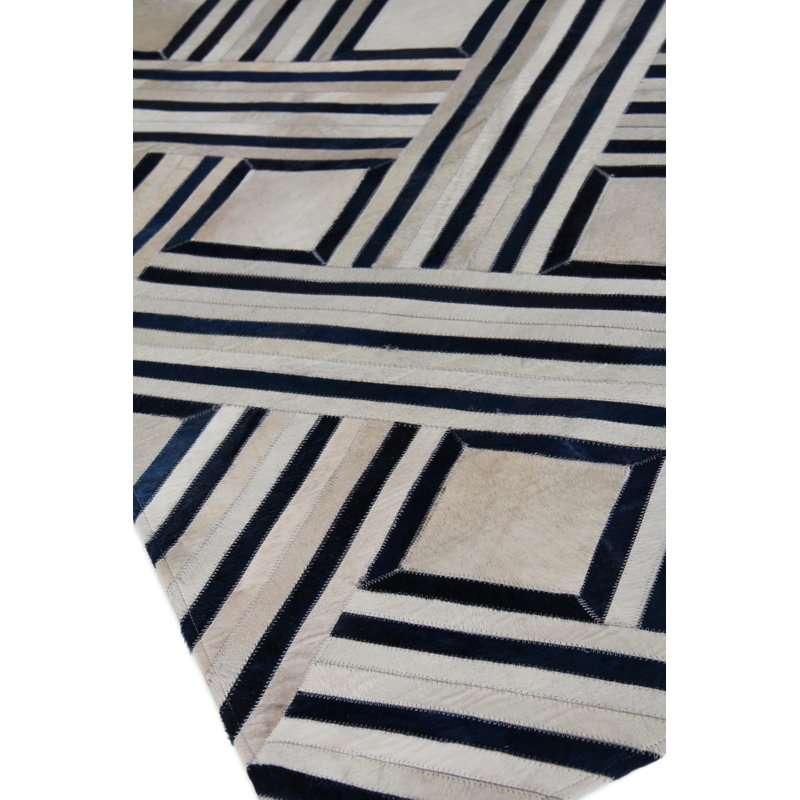 Handmade Ivory and Blue Geometric Cowhide Area Rug