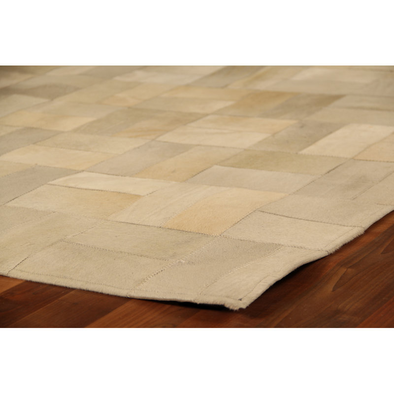Handmade Ivory Geometric Cowhide Rectangular Area Rug