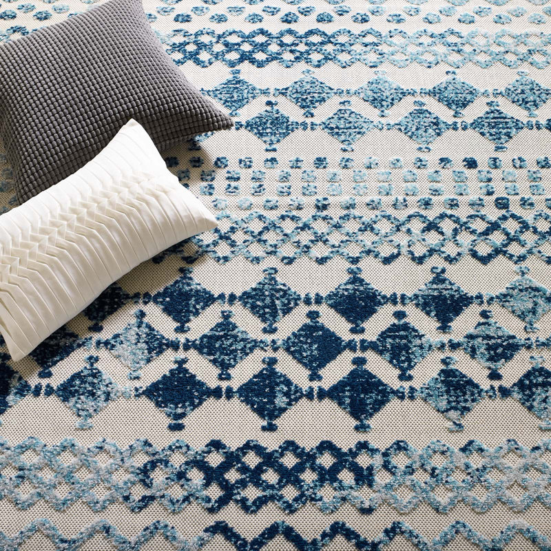 Ivory and Blue Trellis Synthetic 8' x 10' Easy-Care Area Rug