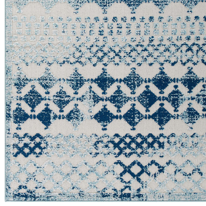 Ivory and Blue Trellis Synthetic 8' x 10' Easy-Care Area Rug
