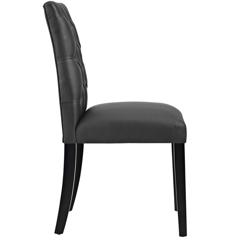 Elegant Curvy Black Faux Leather Dining Chair with Tufted Back