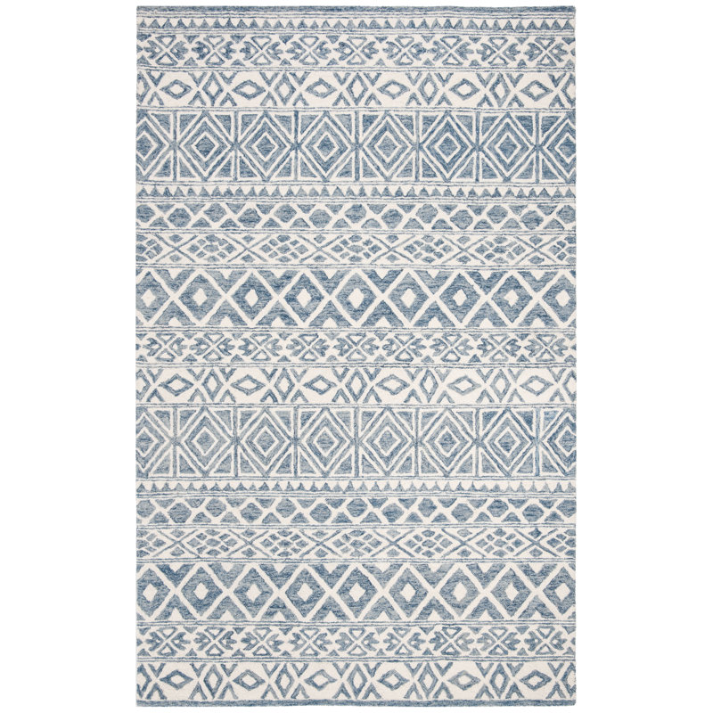 Handmade Ivory Wool 6' x 9' Rectangular Tufted Area Rug