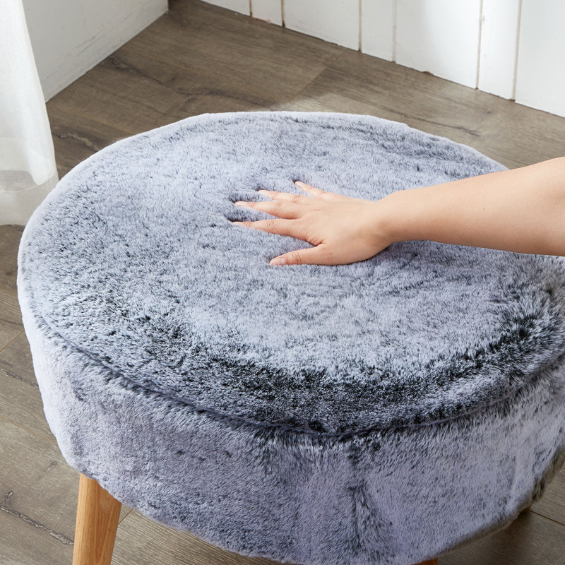 Black Faux Fur Oval Ottoman with Wooden Legs