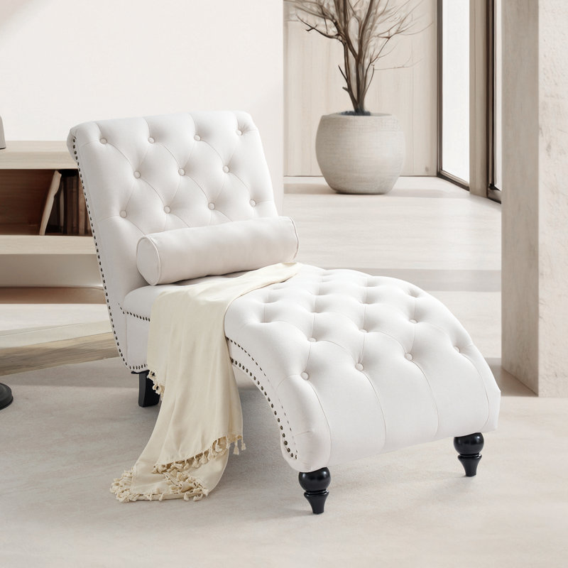 Chaise longue capitonnée avec coussin lombaire
