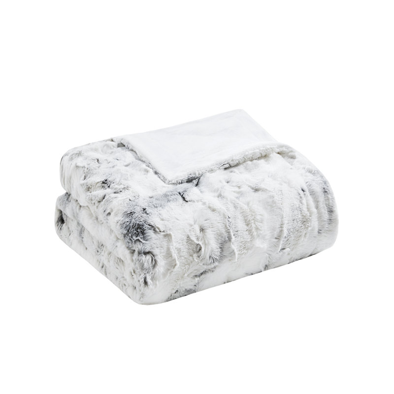 Jeté luxueux en fausse fourrure gris