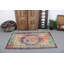 Tapis turc vintage fait à la main avec un motif floral vibrant parfait pour rehausser tout espace de vie