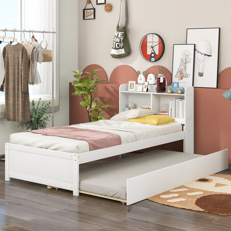 Lit double blanc élégant avec lit gigogne et bibliothèque - Rehaussez le décor de votre chambre. Tête de lit de rangement pour un charme accru.