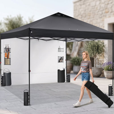 Abri à auvent escamotable 12 x 12 One-Push, tente d'ombrage noire à installation rapide avec toit ventilé enduit d'argent, hauteur réglable, tissu imperméable, paroi de rangement supplémentaire et sac de transport, finition en 1 minute