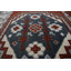 Tapis de style oriental rouge en laine noué à la main