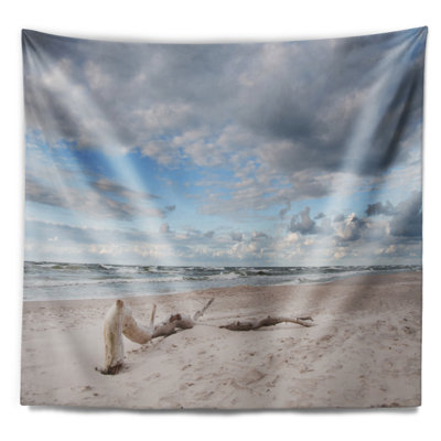 Grande tapisserie de plage sur la plage