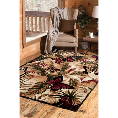 Tapis brun à motif de papillons Eichelberger