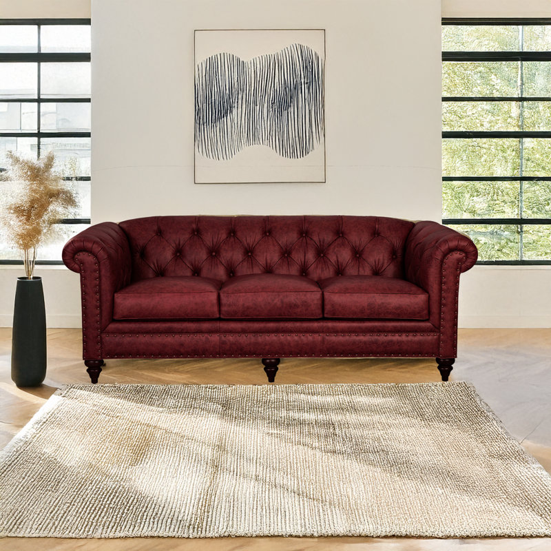 Canapé Chesterfield en cuir véritable à accoudoirs roulés de 88 po Taheem, Rouge