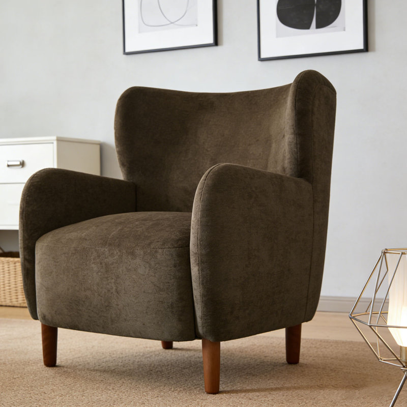 Fauteuil club rembourré à oreilles