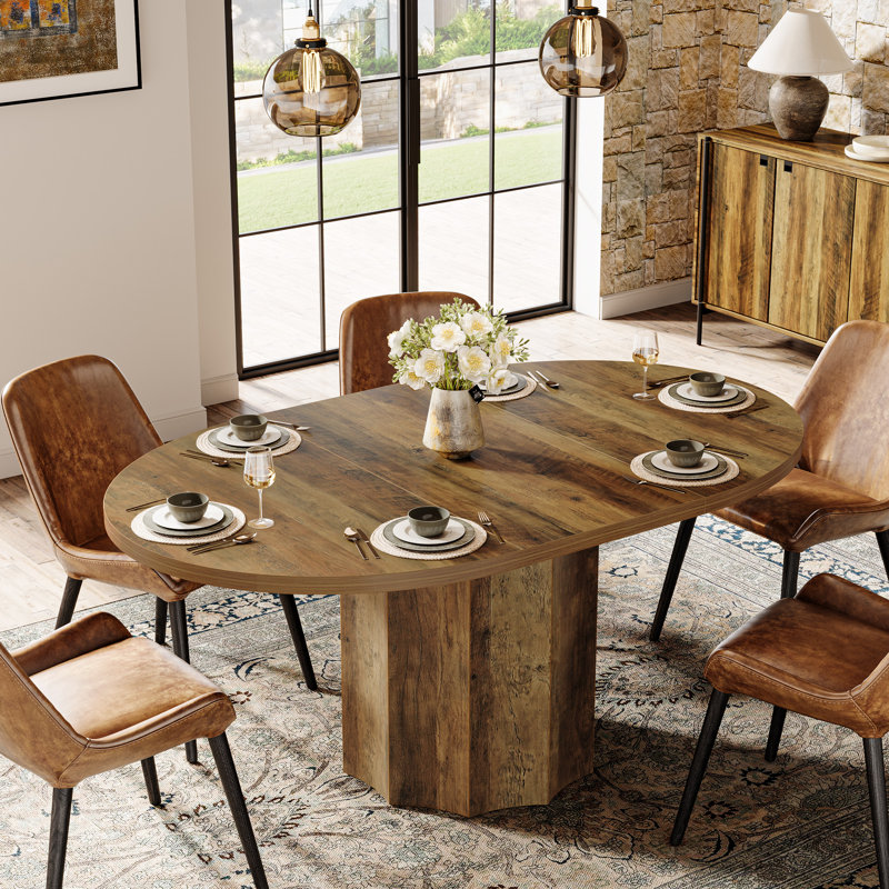 55-Inch Oval Dining Table with Wave-Shaped Base