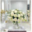 Arrangement de pivoines roses dans un vase