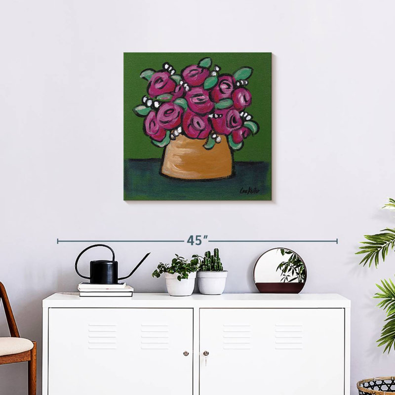 Fleurs en pot rose sur vert