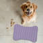 Tapis mauve en forme d'os 1 pièce
