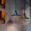 Luminaire suspendu simple noir et or