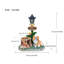 Statue Jack Jack assis avec lanterne solaire