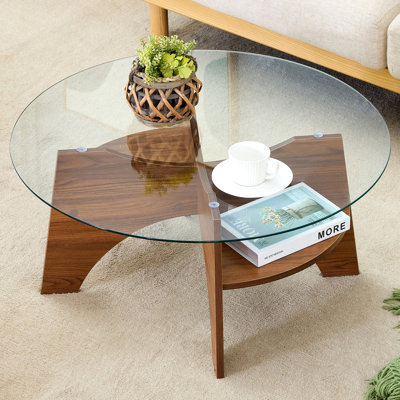 Table basse ronde en verre trempé - 31,5 po de diamètre, conception multifonctionnelle. Conception de piédestal en forme de ventilateur. Pieds en panneau de fibres à densité moyenne à grain de noyer. Convient pour les salles à manger, les salons, les bureaux et plus encore. W1151P256004