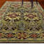 Tapis oriental en laine touffeté chocolat / rouge / jaune Stacey-17940772
