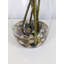 Ficus, saule, branches artificielles dans un vase