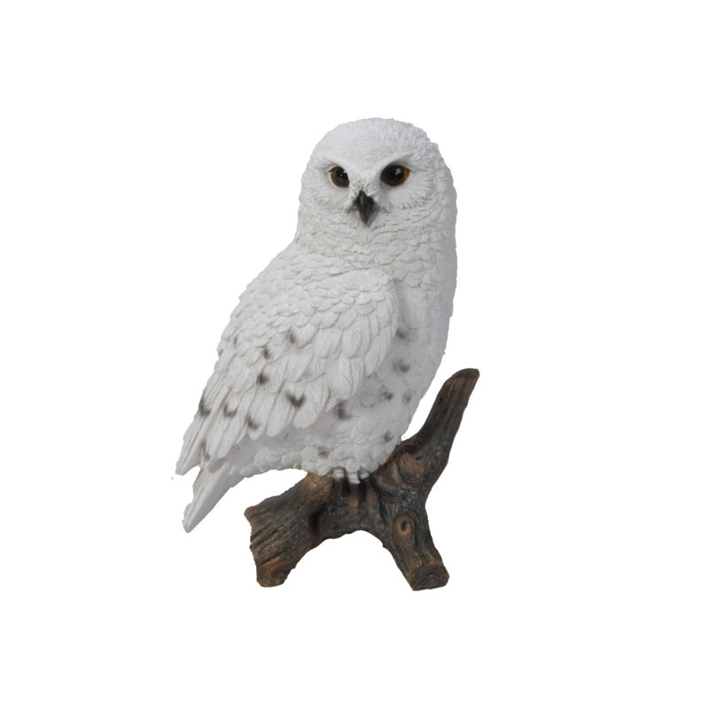 Statue hibou sur souches snowy