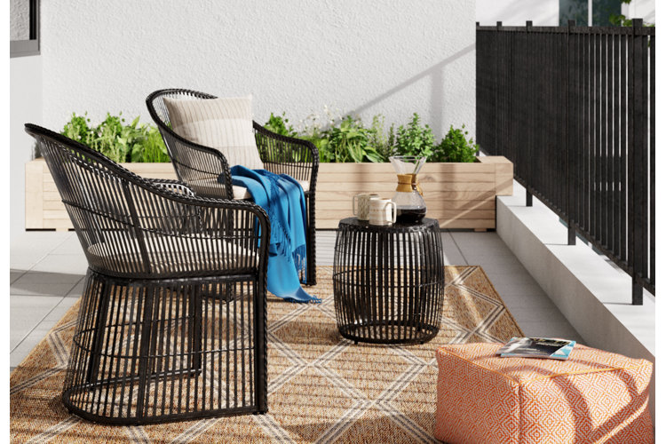 image of outdoor patio area with Adirondack chairs and string lights