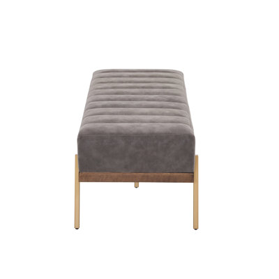 Banquette rembourrée capitonnée avec pieds dorés
