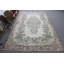 Grand tapis en laine turque beige idéal pour une chambre à coucher confortable avec des accents rétro et orientaux