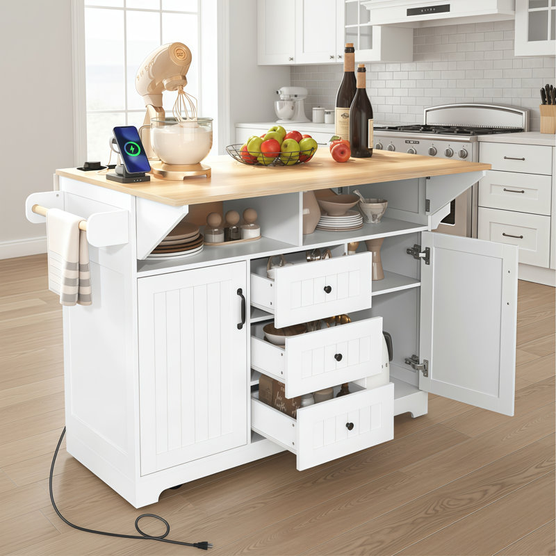 This White, Portable Kitchen Cart Features A Folding Tabletop, A Power Outlet, A Spice Rack, And A Towel Rack—Practical And Aesthetically Pleasing.